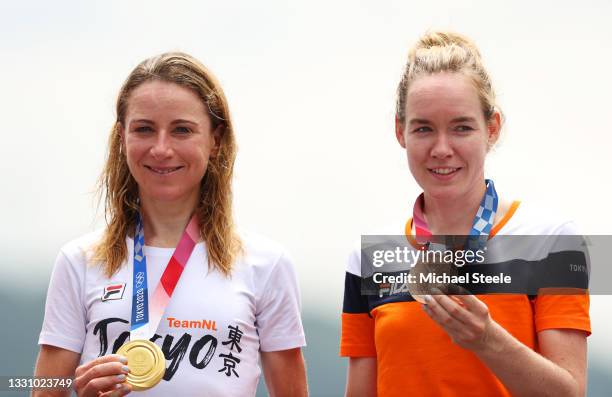 Gold medalist Annemiek van Vleuten of Team Netherlands and bronze medalist Anna van der Breggen of Team Netherlands, pose on the podium during the...