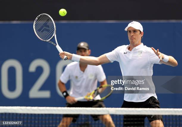 Michael Venus of Team New Zealand and Marcus Daniell of Team New Zealand play against Robert Farah of Team Colombia and Juan-Sebastian Cabalon of...