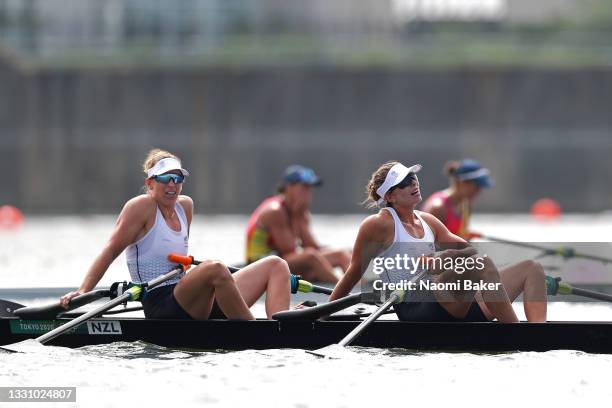 Brooke Donoghue and Hannah Osborne of Team New Zealand react after winning the silver medal during the Women's Double Sculls Final A on day five of...