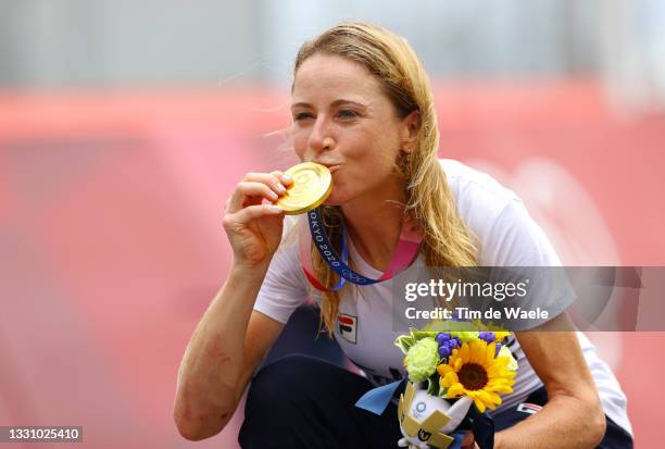 Annemiek van Vleuten of Team Netherlands kisses her gold medal after the Women's Individual time trial on day five of the Tokyo 2020 Olympic Games at...