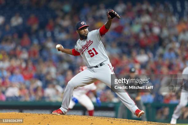Wander Suero of the Washington Nationals throws a pitch against the Philadelphia Phillies at Citizens Bank Park on July 27, 2021 in Philadelphia,...