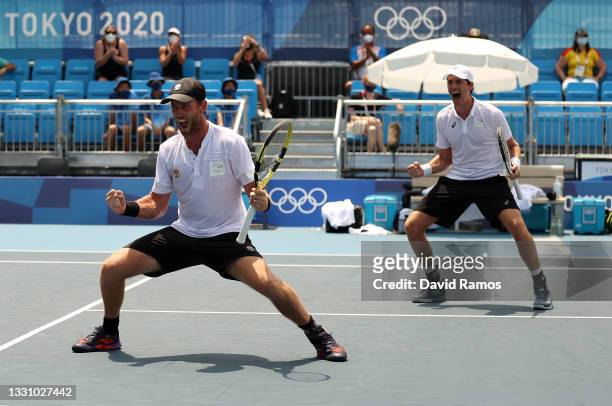 Michael Venus of Team New Zealand and Marcus Daniell of Team New Zealand celebrate after match point during their Men's Doubles Quarterfinal match...