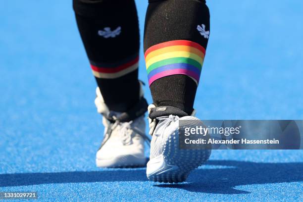 Detailed view of the LGBT rainbow band around the leg of Nike Lorenz of Team Germany during the Women's Preliminary Pool A match between Germany and...