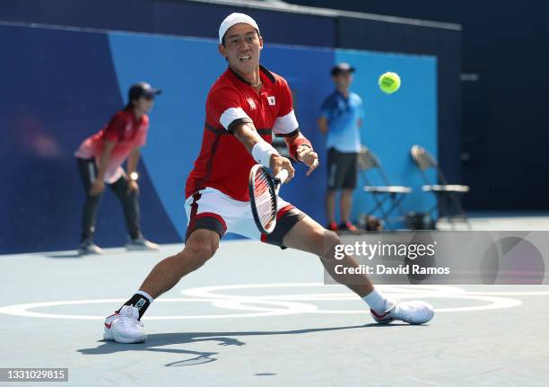 Kei Nishikori of Team Japan plays a forehand during his Men's Singles Third Round match against Ilya Ivashka of Team Belarus on day five of the Tokyo...