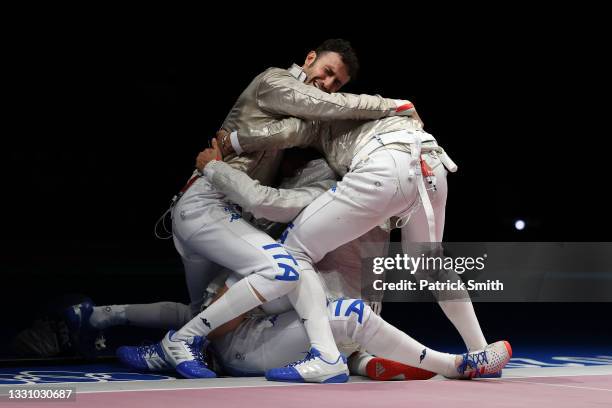 Team Italy celebrates after their win against Team Hungary to advance to the Gold Medal match in Men's Sabre Team on day five of the Tokyo 2020...