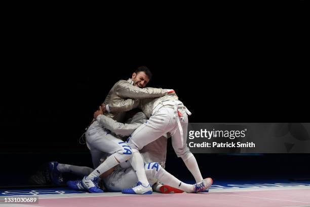 Team Italy celebrates after their win against Team Hungary to advance to the Gold Medal match in Men's Sabre Team on day five of the Tokyo 2020...