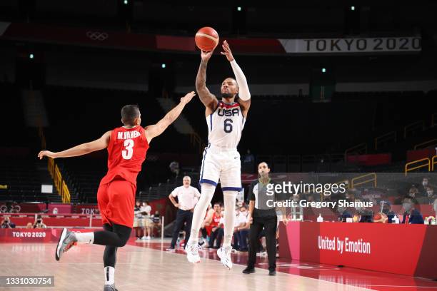 Damian Lillard of Team United States goes up for a shot against Mohammadsina Vahedi of Team Iran during the first half of a Men's Preliminary Round...
