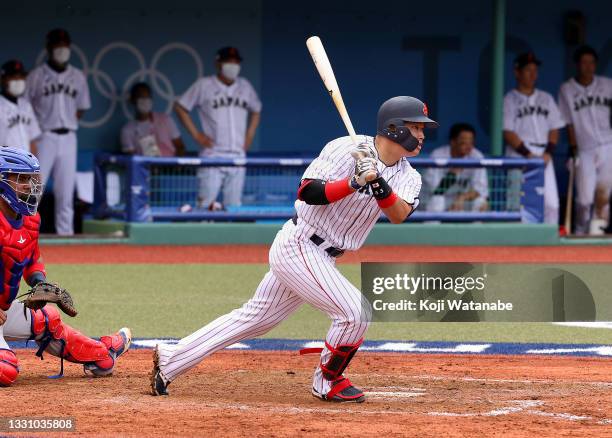 Munetaka Murakami of Team Japan hits an RBI single to right field in the ninth inning against Team Dominican Republic during the baseball opening...