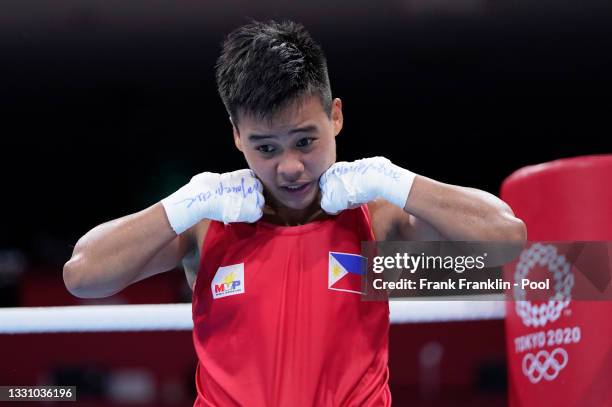 Nesthy Petecio of Philippines reacts after the Women's Feather quarter final on day five of the Tokyo 2020 Olympic Games at Kokugikan Arena on July...