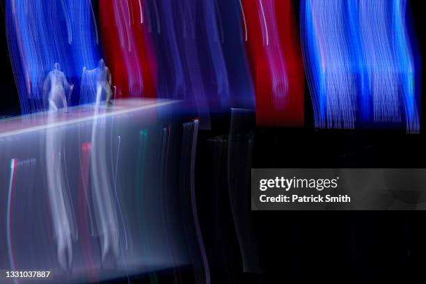 Aldo Montano of Team Italy and Andras Szatamari of Team Hungary compete in the match in Men's Sabre Team Semi-final on day five of the Tokyo 2020...