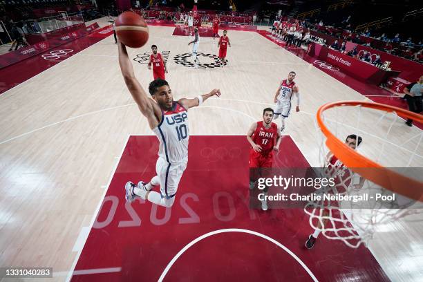 Jayson Tatum of Team United States goes up for a dunk against Iran during a Men's Preliminary Round Group A game on day five of the Tokyo 2020...