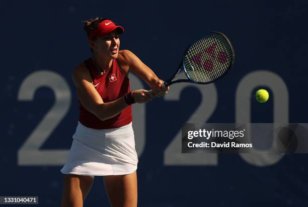 Belinda Bencic of Team Switzerland plays a backhand during her Women's Singles Quarterfinal match against Anastasia Pavlyuchenkova of Team ROC on day...