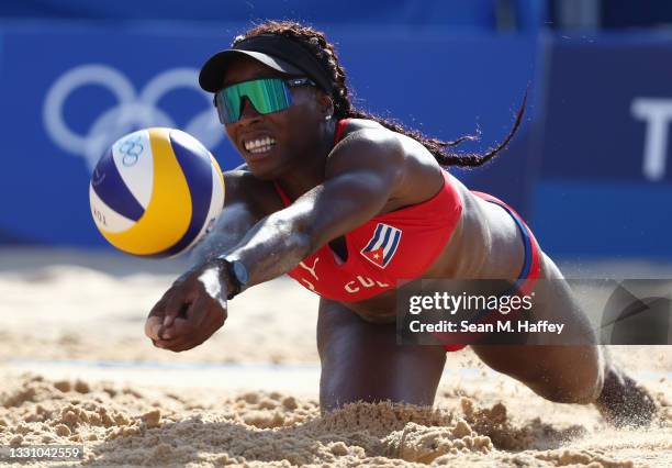 Leila Consuelo Martinez Ortega of Team Cuba competes against Team ROC during the Women's Preliminary Round - Pool E beach volleyball on day five of...