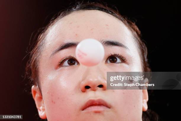 Ito Mima of Team Japan serves the ball during her Women's Singles Quarterfinals table tennis match on day five of the Tokyo 2020 Olympic Games at...