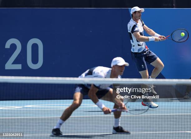 Andy Murray of Team Great Britain and Joe Salisbury of Team Great Britain play Marin Cilic of Team Croatia and Ivan Dodig of Team Croatia during...