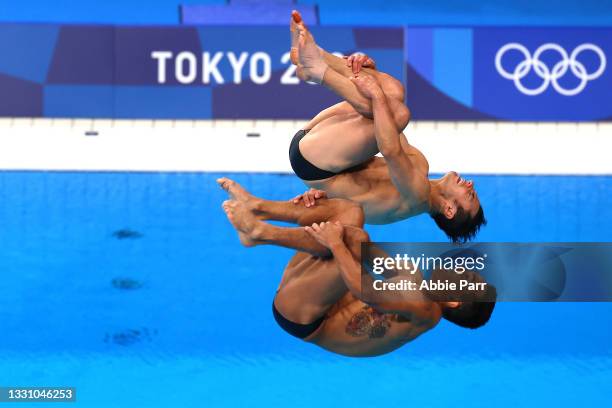 Yahel Castillo Huerta and Juan Manuel Celaya Hernandez of Team Mexico compete during the Men's synchronized three meter final on day five of the...