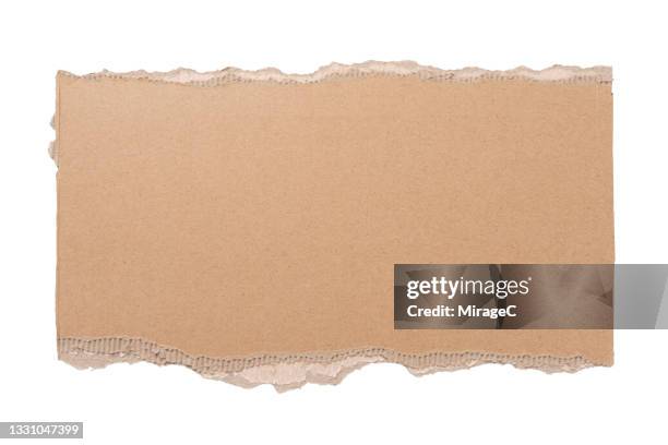 a large piece of torn cardboard isolated on white - embalagem cartonada imagens e fotografias de stock