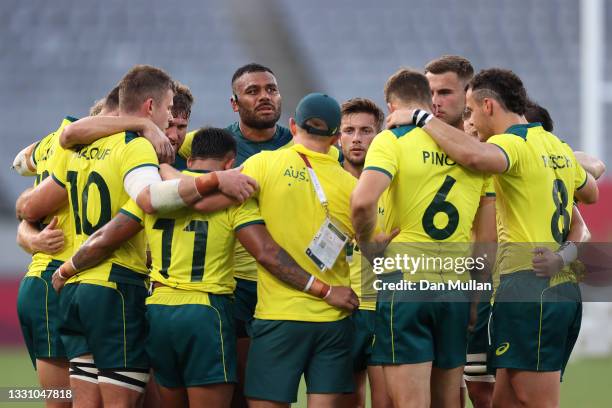 The Team Australia huddle after the Rugby Sevens Men's Placing 7-8 match between Canada and Australia on day five of the Tokyo 2020 Olympic Games at...