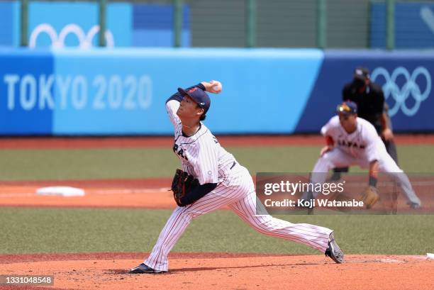 Pitcher Yoshinobu Yamamoto of Team Japan pitches in the second inning against Team Dominican Republic during the baseball opening round Group A game...