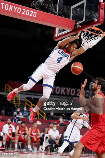 Keldon Johnson of Team United States dunks the ball against Iran during the first half of a Men's Preliminary Round Group A game on day five of the...
