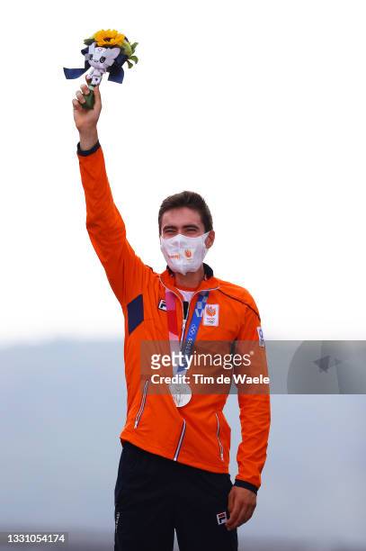 Tom Dumoulin of Team Netherlands poses with the silver medal after the Men's Individual time trial on day five of the Tokyo 2020 Olympic Games at...