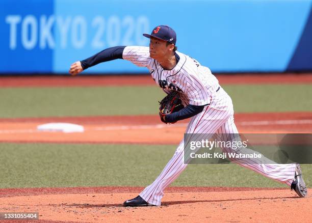 Pitcher Yoshinobu Yamamoto of Team Japan pitches in the second inning against Team Dominican Republic during the baseball opening round Group A game...