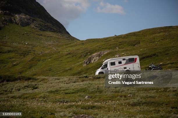 camper van driving on a mountain road - car and motorcycle on mountain road stock pictures, royalty-free photos & images