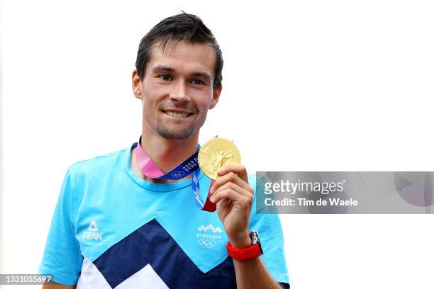Primoz Roglic of Team Slovenia poses with the gold medal after the Men's Individual time trial on day five of the Tokyo 2020 Olympic Games at Fuji...