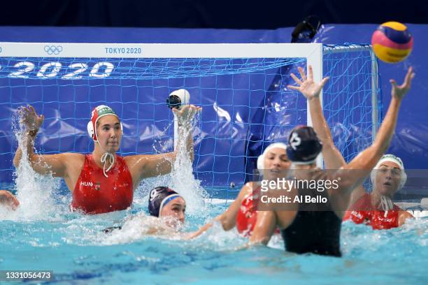 Alda Magyari of Team Hungary defends against Alys Williams of Team United States during the Women's Preliminary Round Group B match between Hungary...