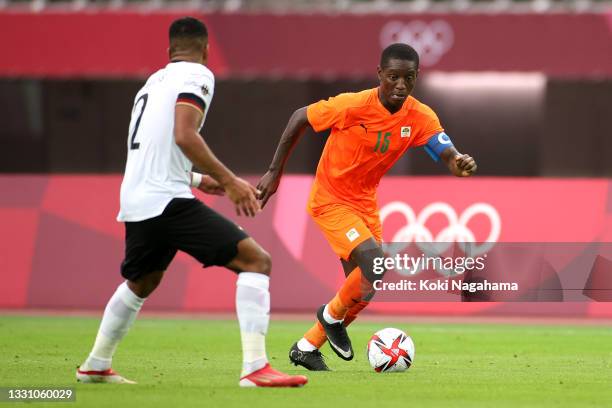 Max Gradel of Team Ivory Coast runs with the ball during the Men's Group D match between Germany and Cote d'Ivoire on day five of the Tokyo 2020...