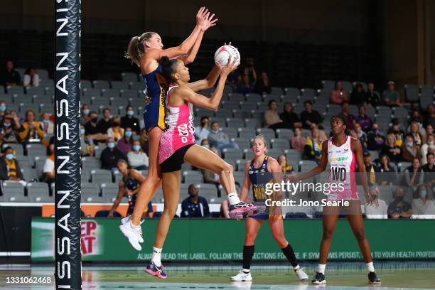 Shamera Sterling of the Thunderbirds intercepts the ball during the round 12 Super Netball match between Sunshine Coast Lightning and Adelaide...