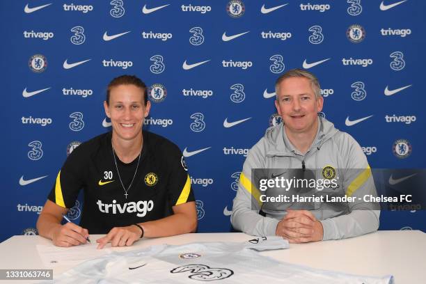 Ann-Katrin Berger of Chelsea poses for a photograph with Paul Green, General Manager of Chelsea as she signs a Contract Extension with Chelsea FC...