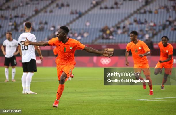 Youssouf Dao of Team Ivory Coast celebrates after scoring their side's first goal during the Men's Group D match between Germany and Cote d'Ivoire on...