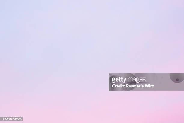 sky above from pink to pale blue color gradient - powder blue foto e immagini stock