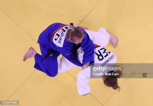 Giovanna Scoccimarro of Team Germany and Sanne van Dijke of Team Netherlands compete during the Women’s Judo 70kg Contest for Bronze Medal B on day...