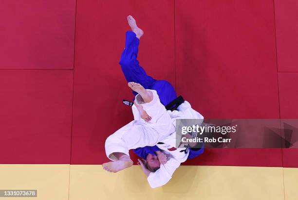 Giovanna Scoccimarro of Team Germany and Sanne van Dijke of Team Netherlands compete during the Women’s Judo 70kg Contest for Bronze Medal B on day...