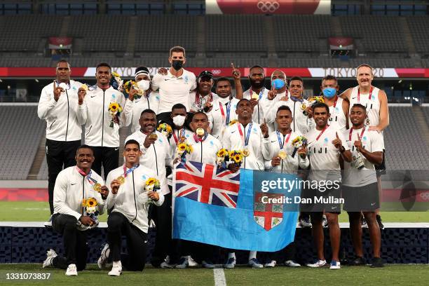 Team Fiji pose with their gold medals after winning the Rugby Sevens Men's Gold Medal match between New Zealand and Fiji on day five of the Tokyo...