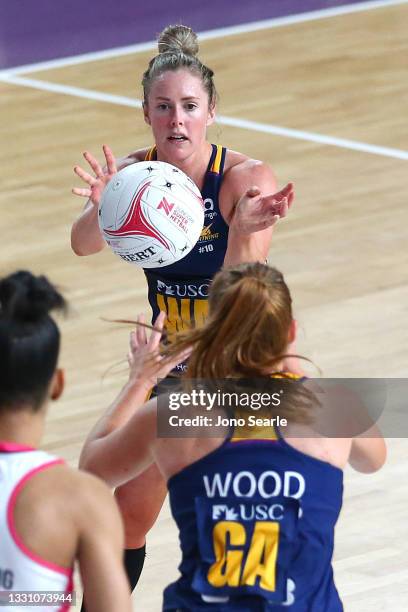 Laura Scherian of the Lightning passes the ball during the round 12 Super Netball match between Sunshine Coast Lightning and Adelaide Thunderbirds at...