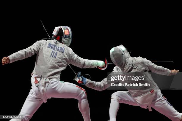 Aldo Montano of Team Italy competes against Junghwan Kim of Team South Korea during the Men's Sabre Team Gold Medal Match on day five of the Tokyo...