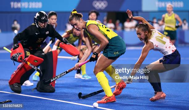 Grace Stewart of Team Australia and Maho Segawa of Team Japan battle for the ball during the Women's Preliminary Pool B match between Japan and...