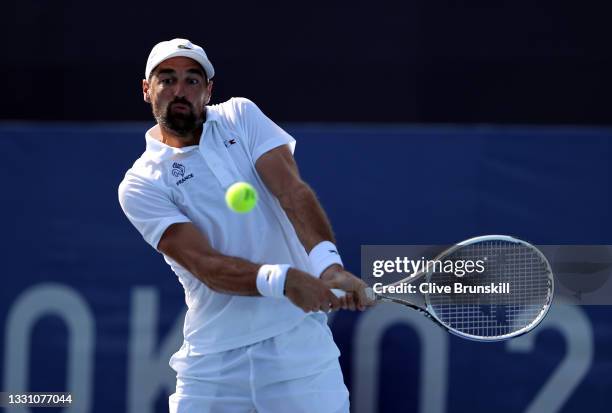 Jeremy Chardy of Team France plays a backhand during his Men's Singles Third Round match against Liam Broady of Team Great Britain on day five of the...