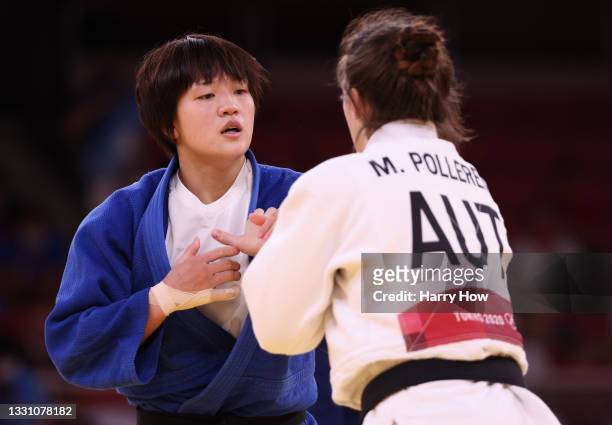 Michaela Polleres of Team Austria and Chizuru Arai of Team Japan compete during the Women’s Judo 70kg Final on day five of the Tokyo 2020 Olympic...