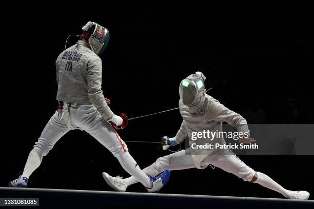 Aldo Montano of Team Italy competes against Junghwan Kim of Team South Korea (R0 during the Men's Sabre Team Gold Medal Match on day five of the...