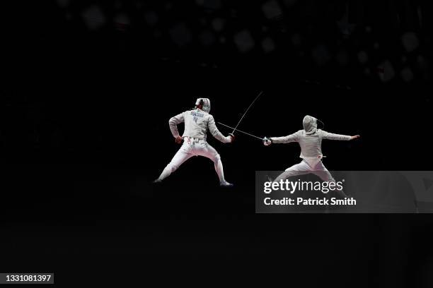 Aldo Montano of Team Italy competes against Bongil Gu of Team South Korea during the Men's Sabre Team Gold Medal Match on day five of the Tokyo 2020...