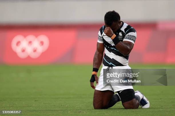 Jerry Tuwai of Team Fiji reacts on the final whistle following victory in the Rugby Sevens Men's Gold Medal match between New Zealand and Fiji on day...