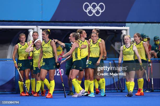 Australia players celebrate victory following the Women's Preliminary Pool B match between Japan and Australia on day five of the Tokyo 2020 Olympic...