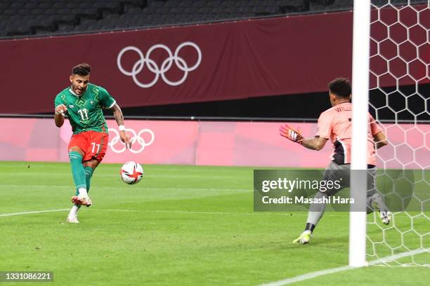 Alexis Vega of Team Mexico scores their side's first goal during the Men's First Round Group A match between South Africa and Mexico on day five of...