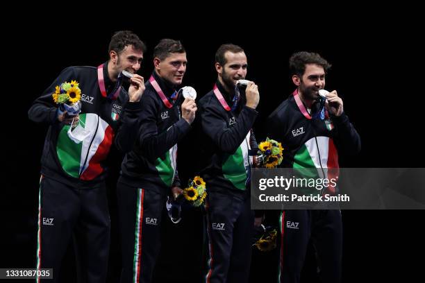 Silver medalists Luca Curatoli, Luigi Samele, Enrico Berre' and Aldo Montano of Team Italy pose with their silver medals during the Men's Sabre Team...