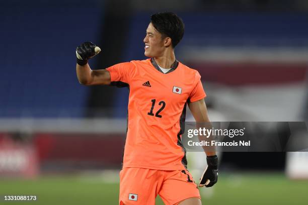 Kosei Tani of Team Japan celebrates after their side's second goal scored by Hiroki Sakai during the Men's Group A match between France and Japan on...