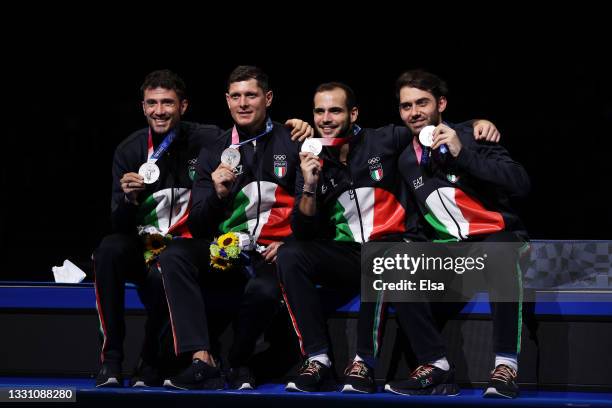 Silver medalists Luca Curatoli, Luigi Samele, Enrico Berre' and Aldo Montano of Team Italy pose with their silver medals during the Men's Sabre Team...